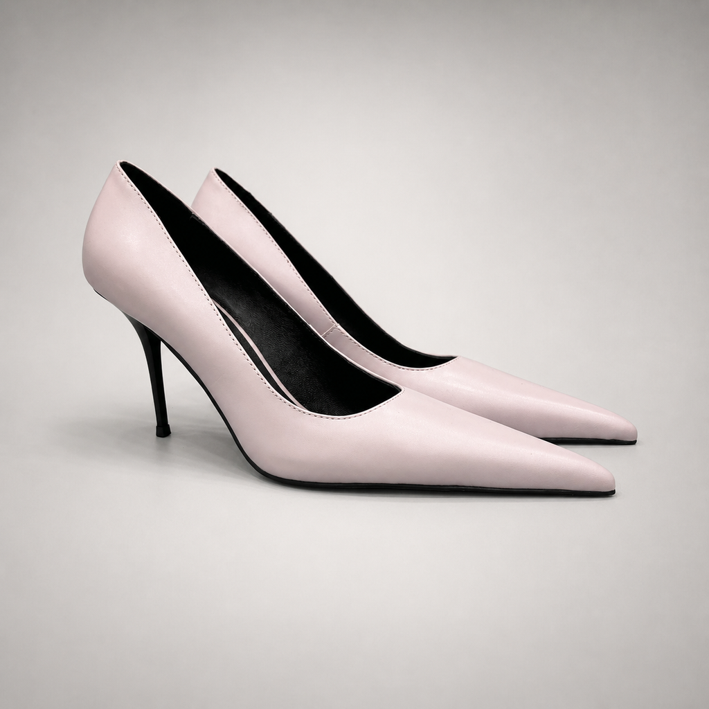 Pink pump pair three-quarter view showing a pointed toe