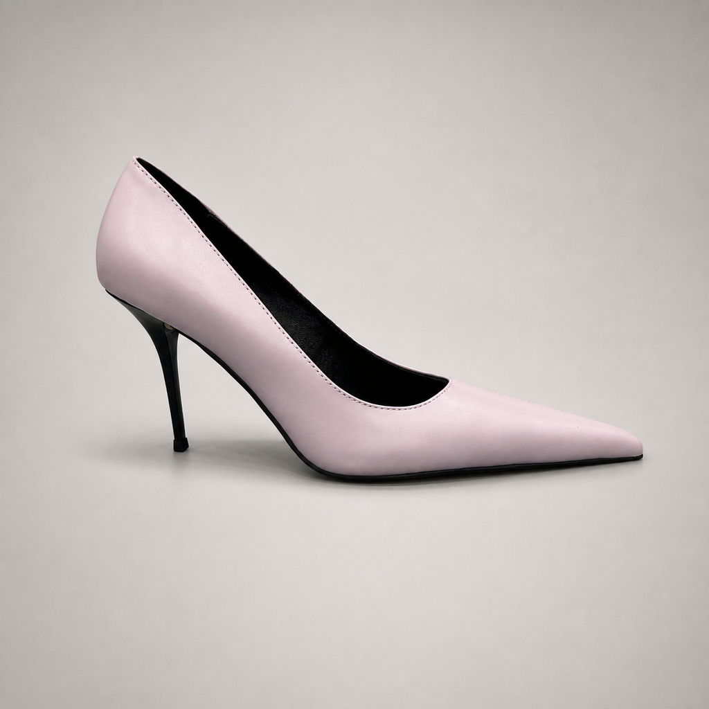 Pink pump side profile showing a pointed toe