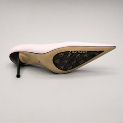 Pink pump outsole view showing the cow leather outsole