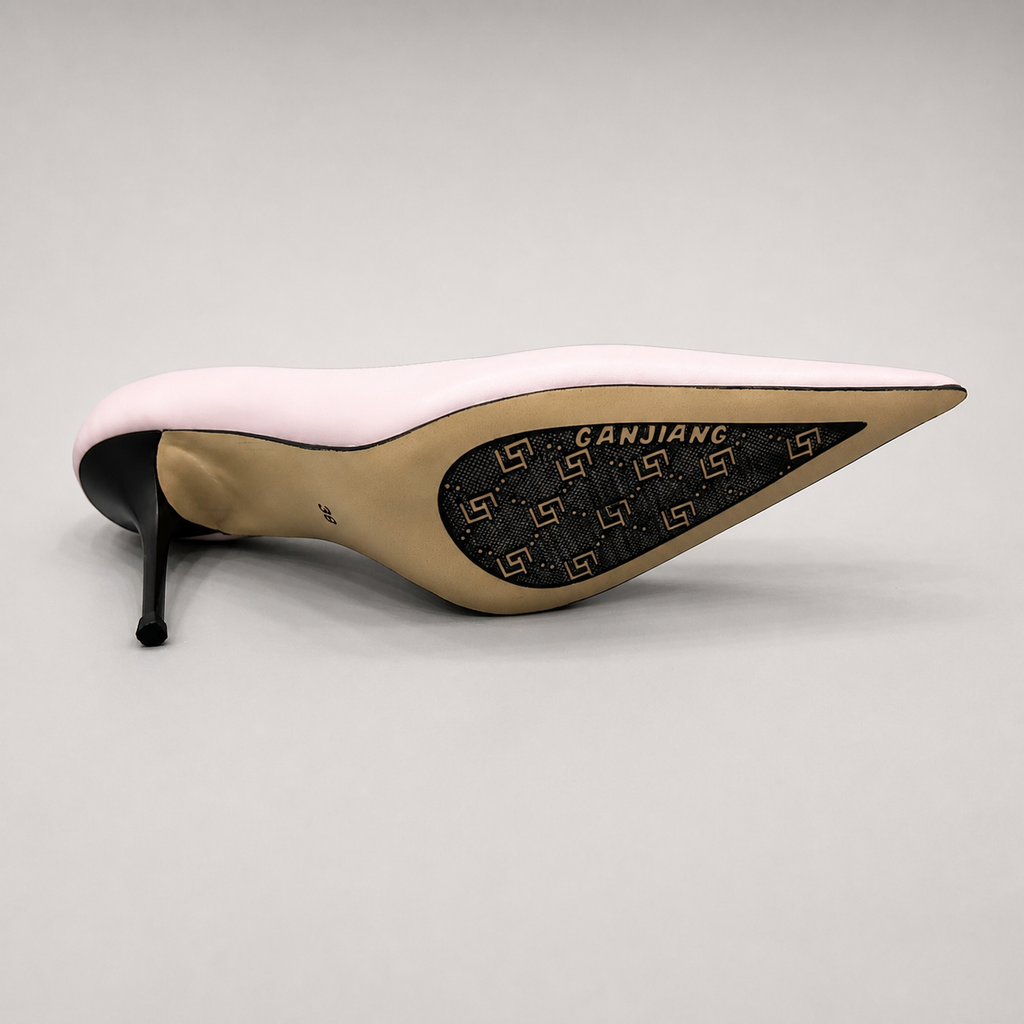 Pink pump outsole view showing the cow leather outsole