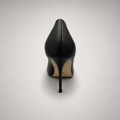 Black pump rear view showing a pointed toe