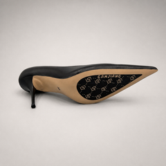 Black pump outsole view showing the cow leather outsole