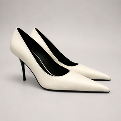 White pump pair three-quarter view showing a pointed toe
