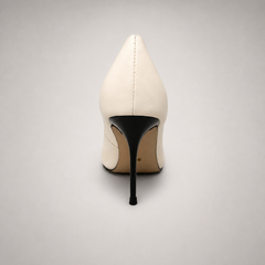 White pump rear view showing a pointed toe