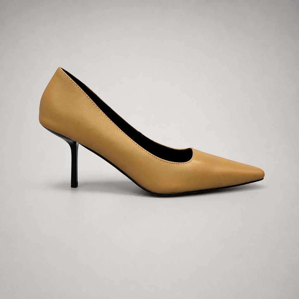 Tan pump side profile showing a pointed toe