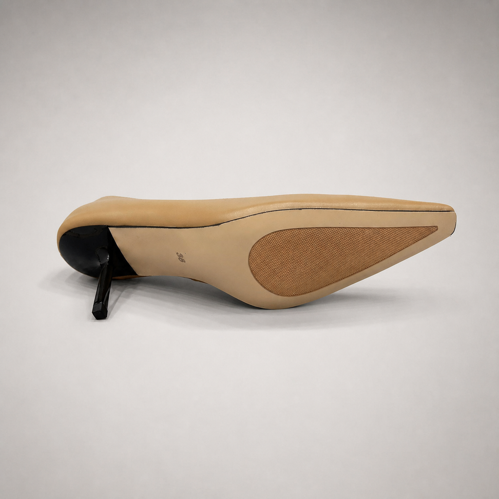 Tan pump outsole view showing the cow leather outsole