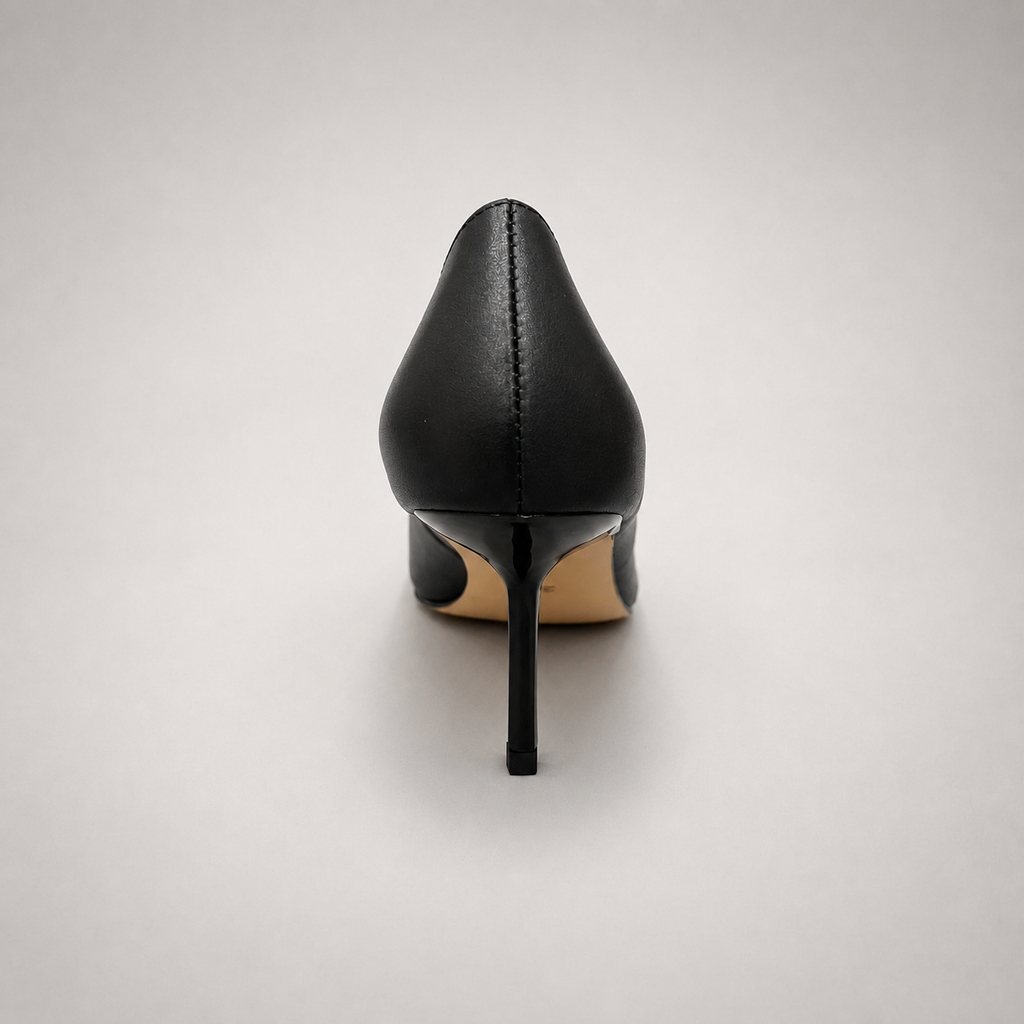 Black pump rear view showing a pointed toe