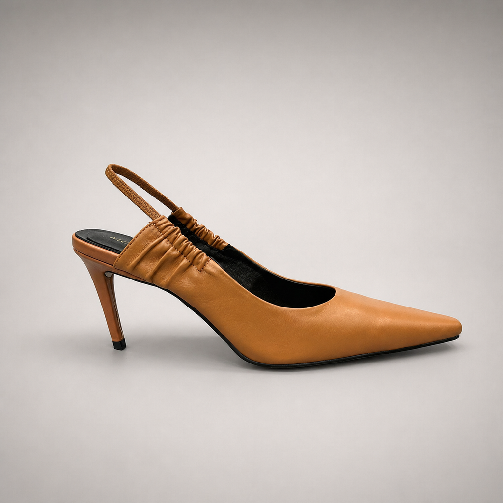 Tan slingback pump side profile showing a pointed toe and gathered slingback strap