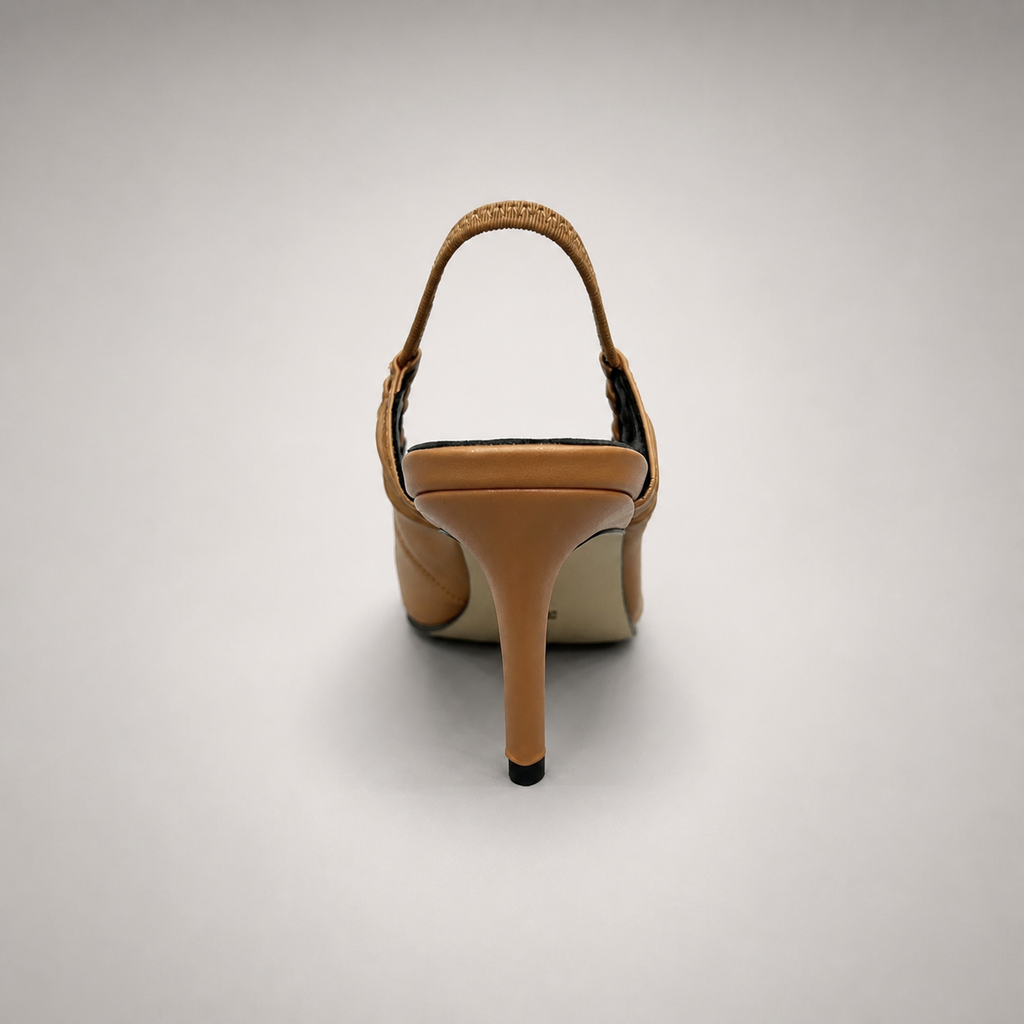Tan slingback pump rear view showing a pointed toe and gathered slingback strap