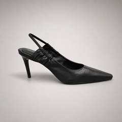 Black slingback pump side profile showing a pointed toe