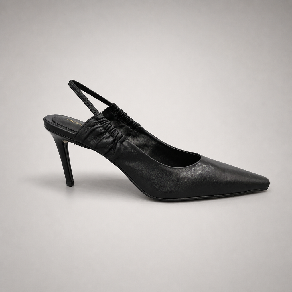 Black slingback pump side profile showing a pointed toe