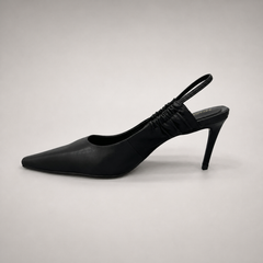 Black slingback pump opposite side profile showing a pointed toe