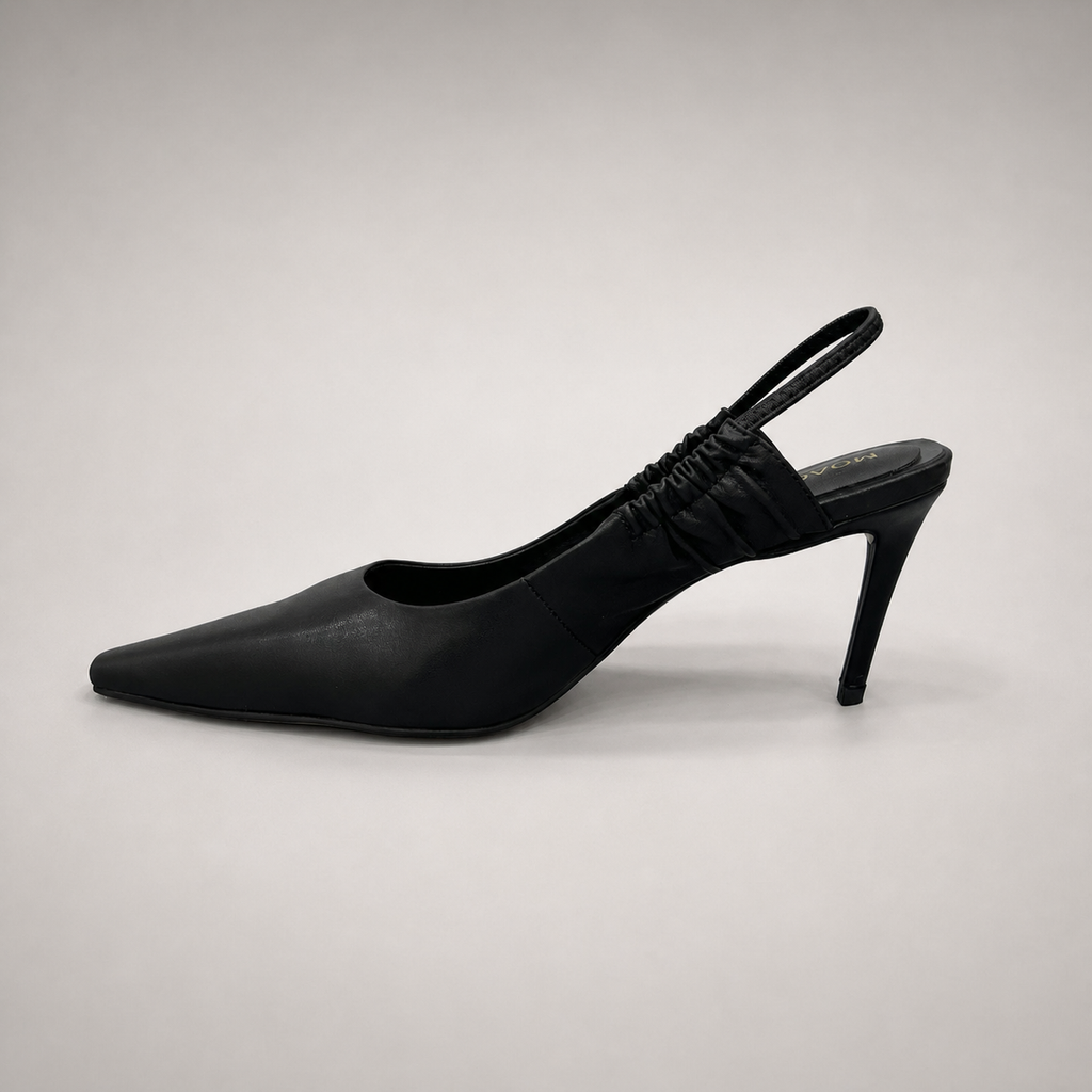 Black slingback pump opposite side profile showing a pointed toe