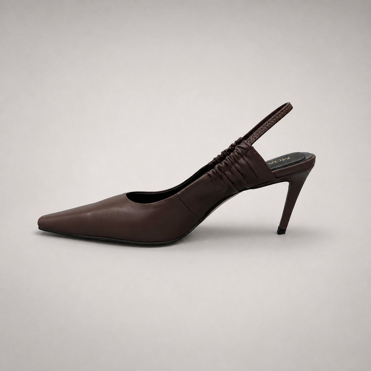 Brown slingback pump alternate side profile showing a pointed toe and gathered slingback strap