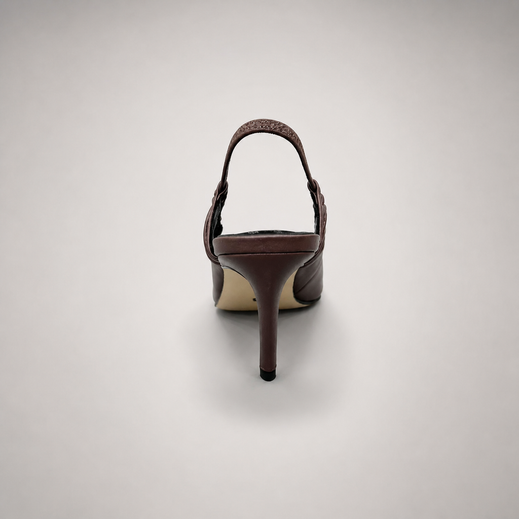 Brown slingback pump rear view showing a pointed toe and gathered slingback strap