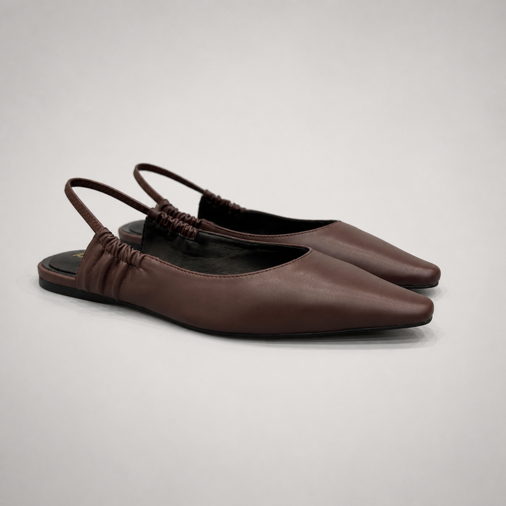 Brown slingback flat pair three-quarter view showing a square toe and gathered slingback strap