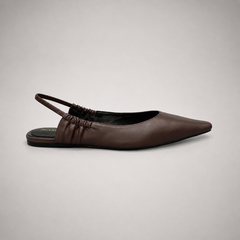 Brown slingback flat side profile showing a square toe and gathered slingback strap