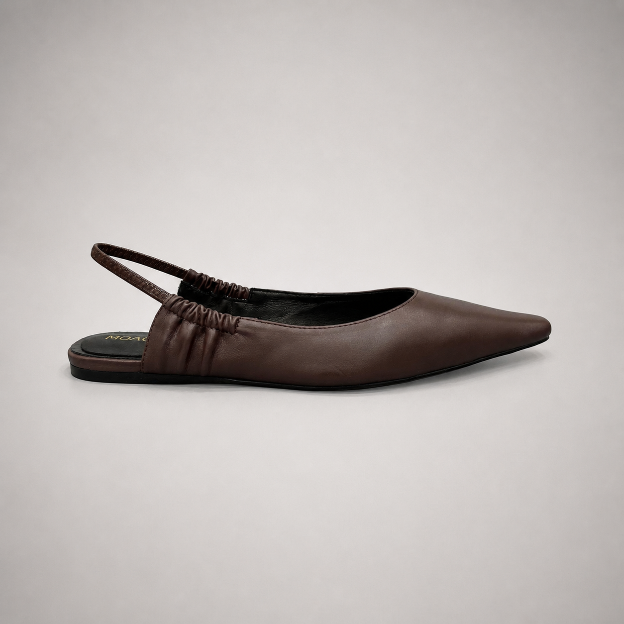 Brown slingback flat side profile showing a square toe and gathered slingback strap