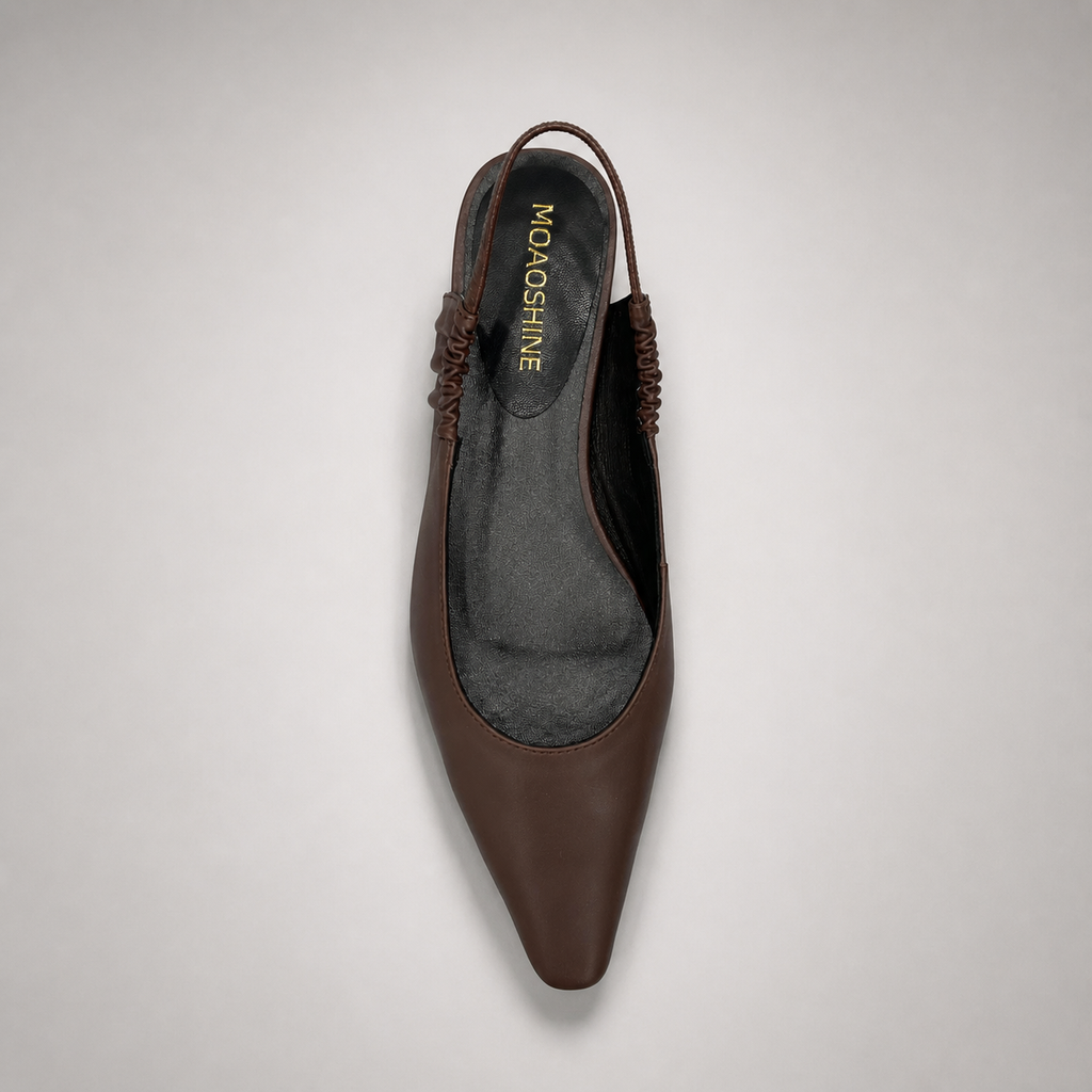 Brown slingback flat outsole view showing the cow leather outsole