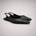 Black slingback flat pair three-quarter view showing a square toe and gathered slingback strap