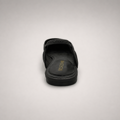 Black slingback flat rear view showing a square toe and gathered slingback strap