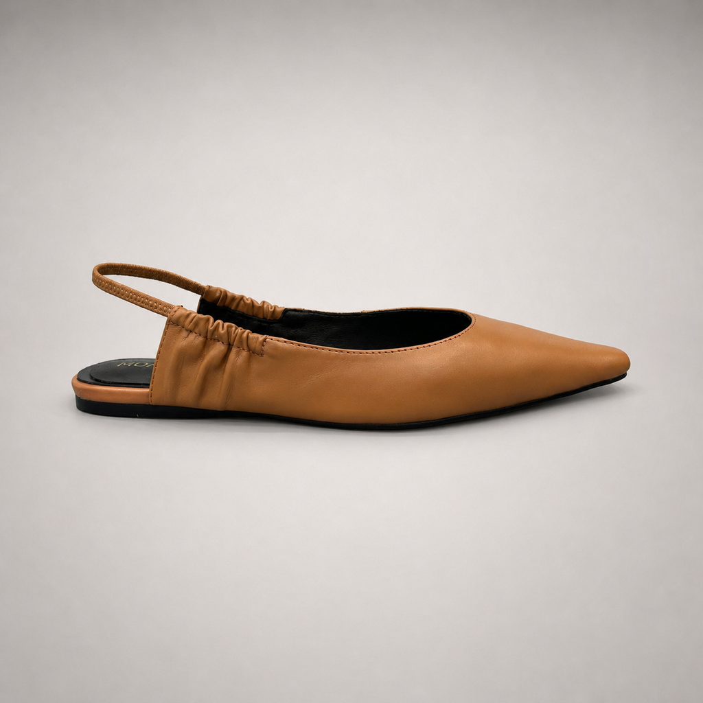 Tan slingback flat side profile showing a square toe and gathered slingback strap