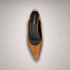 Tan slingback flat outsole view showing the cow leather outsole