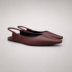 Burgundy slingback flat pair three-quarter view showing a square toe and gathered slingback strap