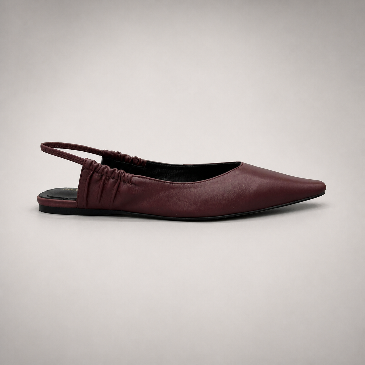 Burgundy slingback flat side profile showing a square toe and gathered slingback strap