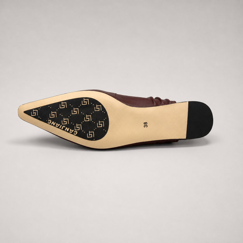 Burgundy slingback flat outsole view showing the cow leather outsole