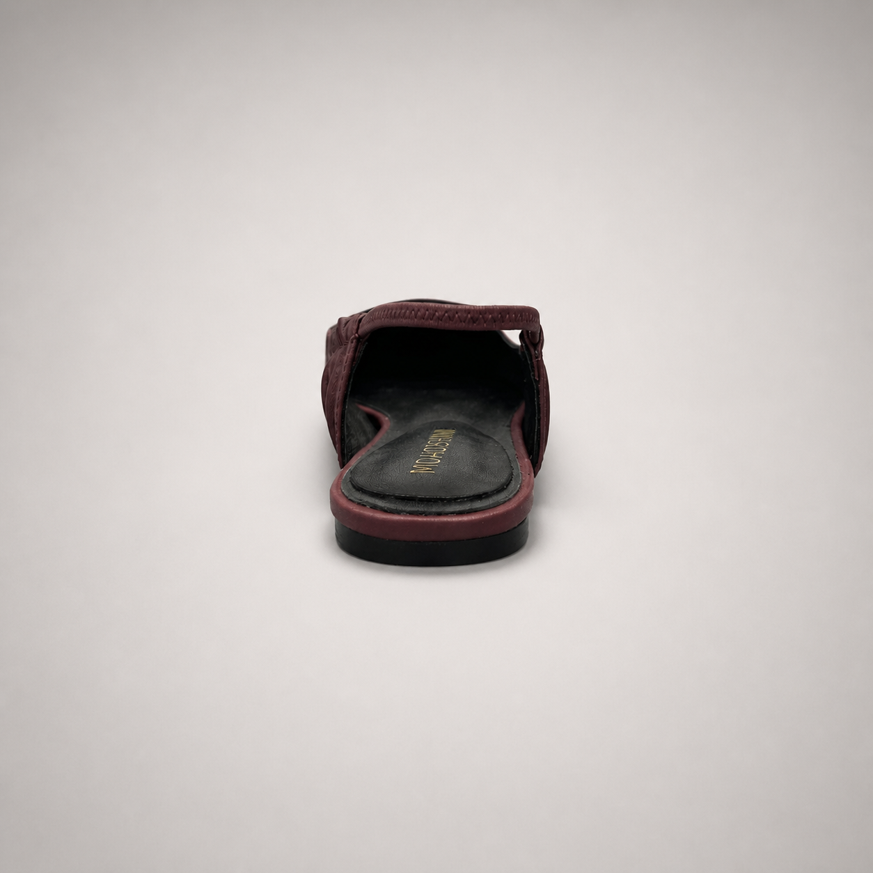 Burgundy slingback flat top view showing a square toe and gathered slingback strap