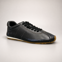 Black low-profile lace-up sneaker pair three-quarter view