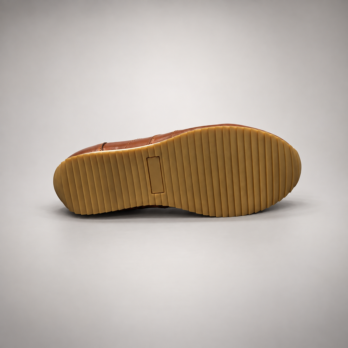 Brown washed leather lace-up sneaker outsole view