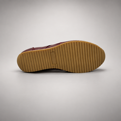 Burgundy washed leather lace-up sneaker outsole view