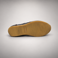 Black washed leather lace-up sneaker outsole view