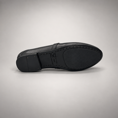 Black washed leather horsebit loafer outsole view