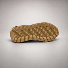 Dark brown perforated leather platform sneaker outsole view