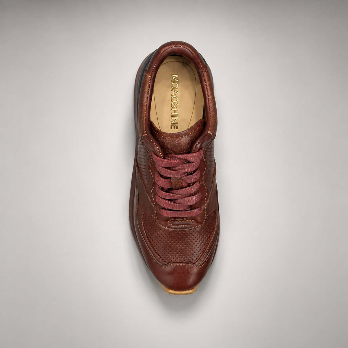 Dark brown perforated leather platform sneaker top view