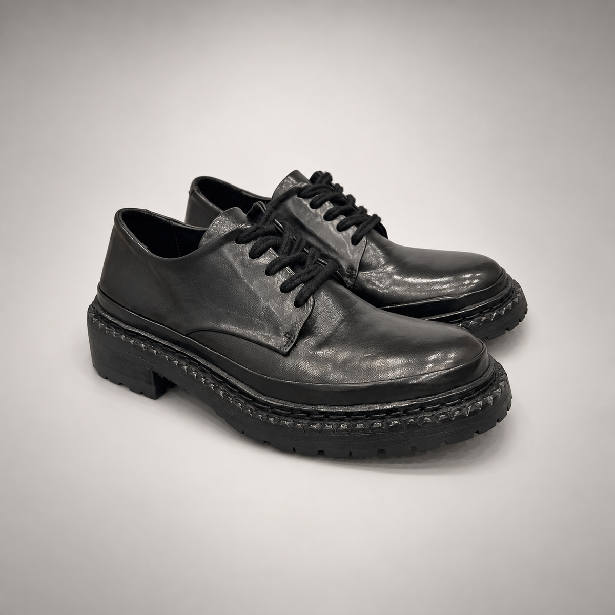 Black washed leather platform derby shoe pair view