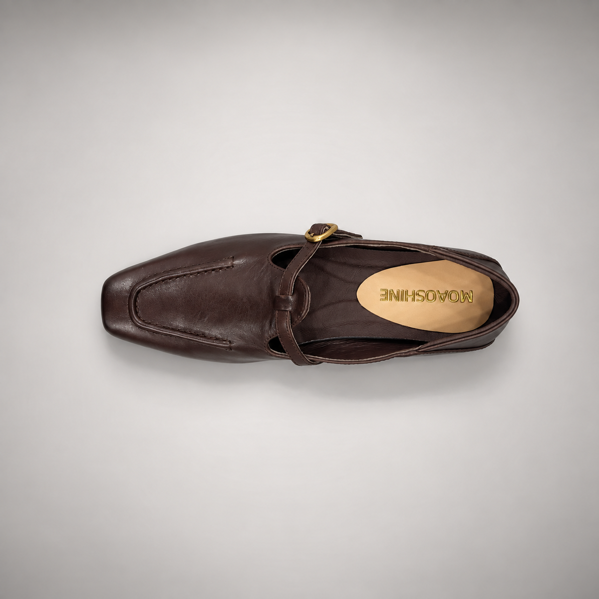 Dark brown leather buckle-strap shoe top view