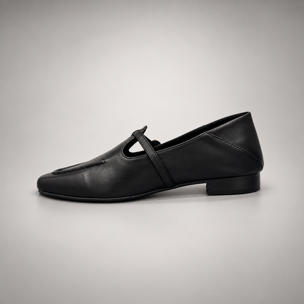 Black leather buckle-strap shoe opposite-side view