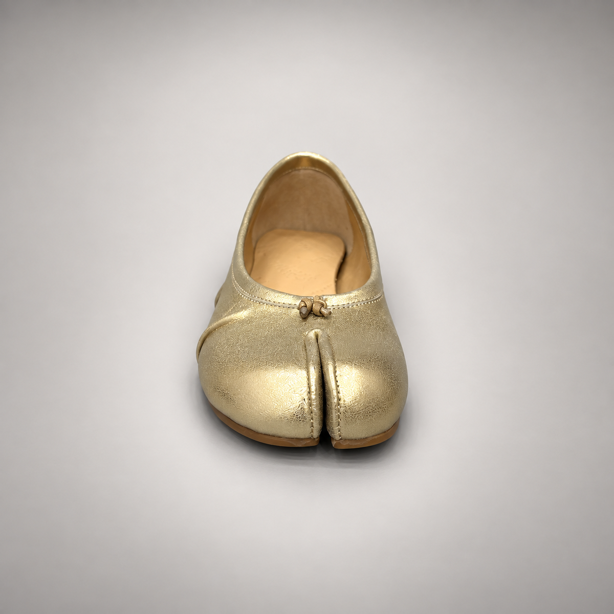 Gold Leather Split-Toe Bow Ballet Flats outsole view