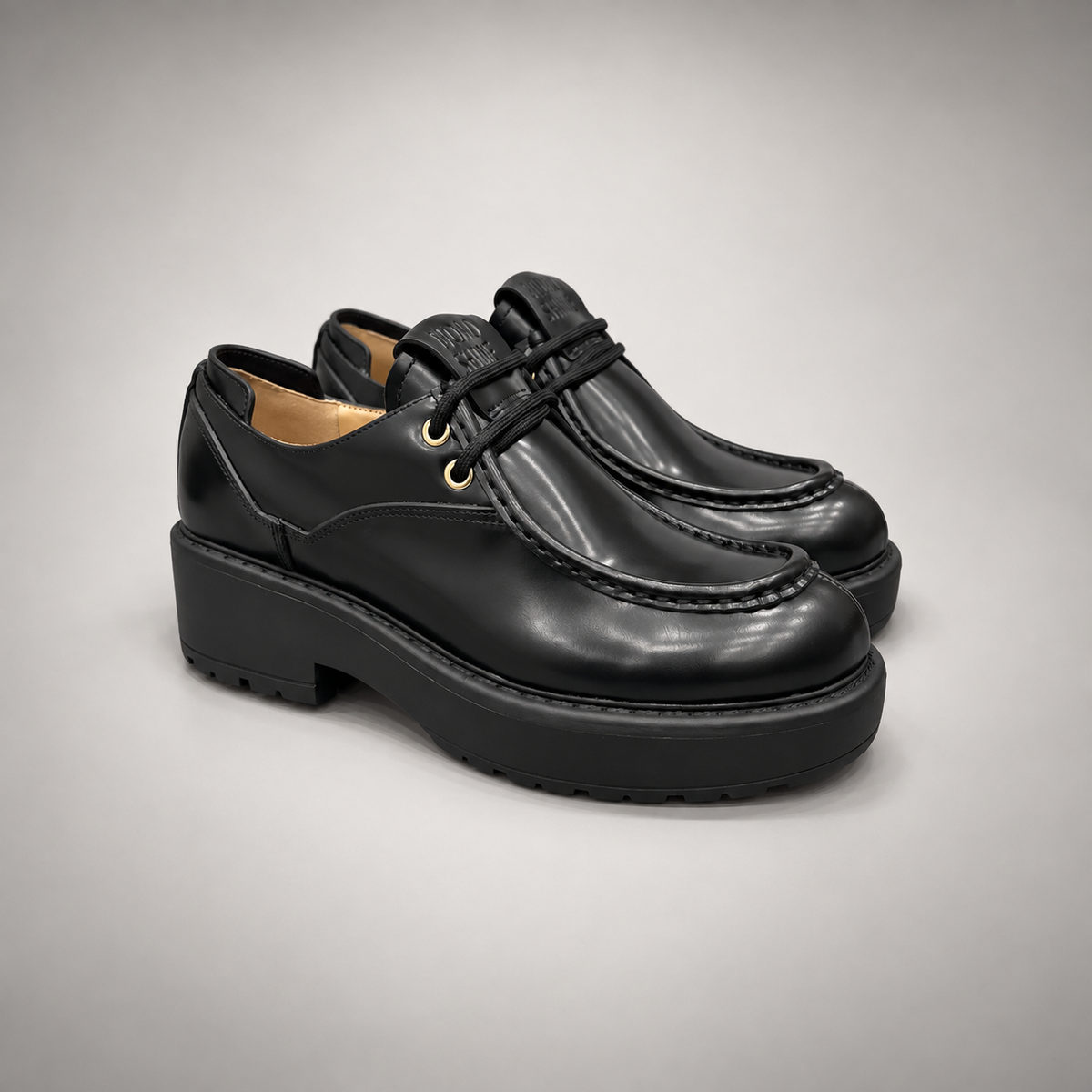 Black Polished Leather Platform Moc-Toe Lace-Up Shoes pair view