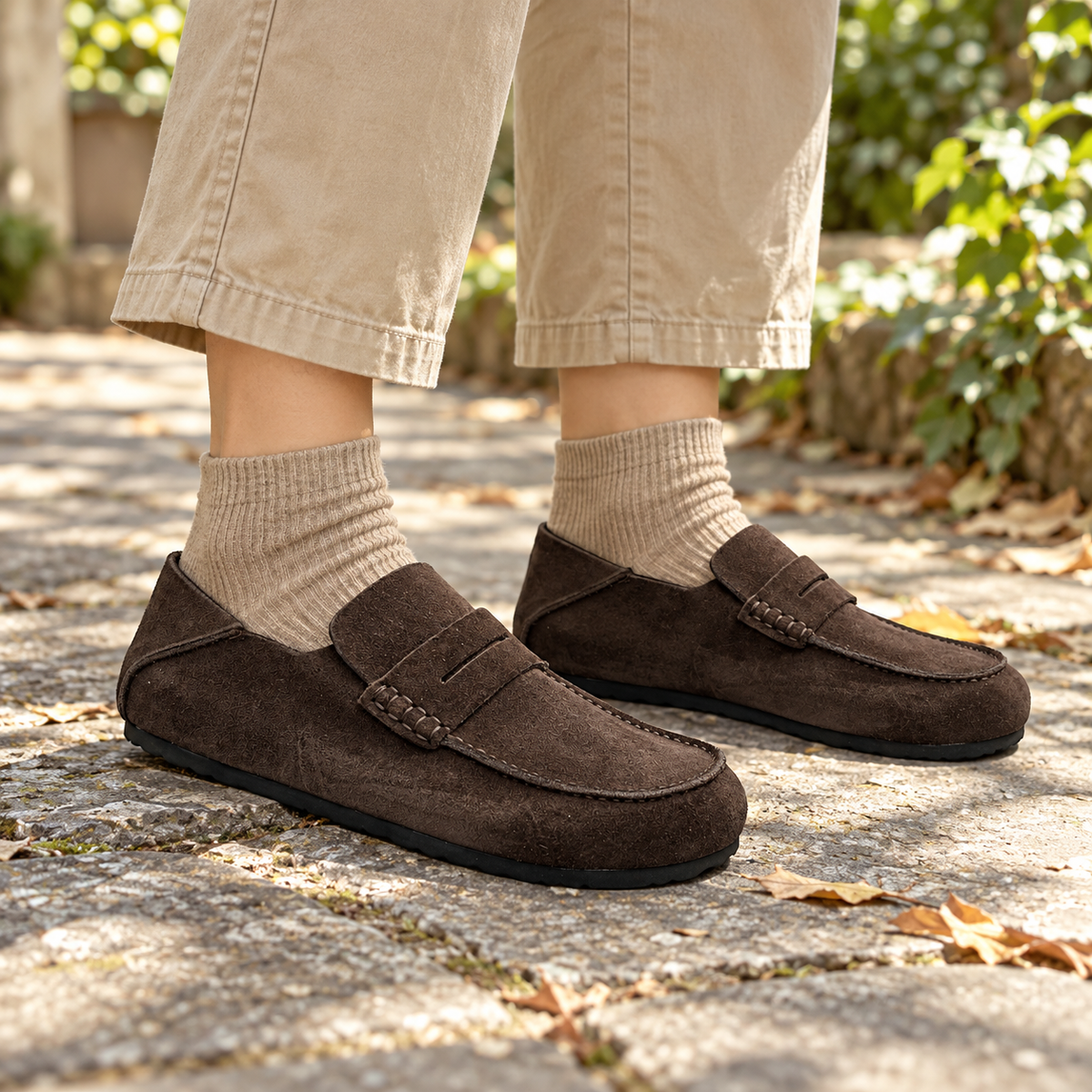Dark Brown Calf Suede Penny Loafers worn outdoors