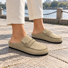 Taupe Calf Suede Penny Loafer Mules worn outdoors