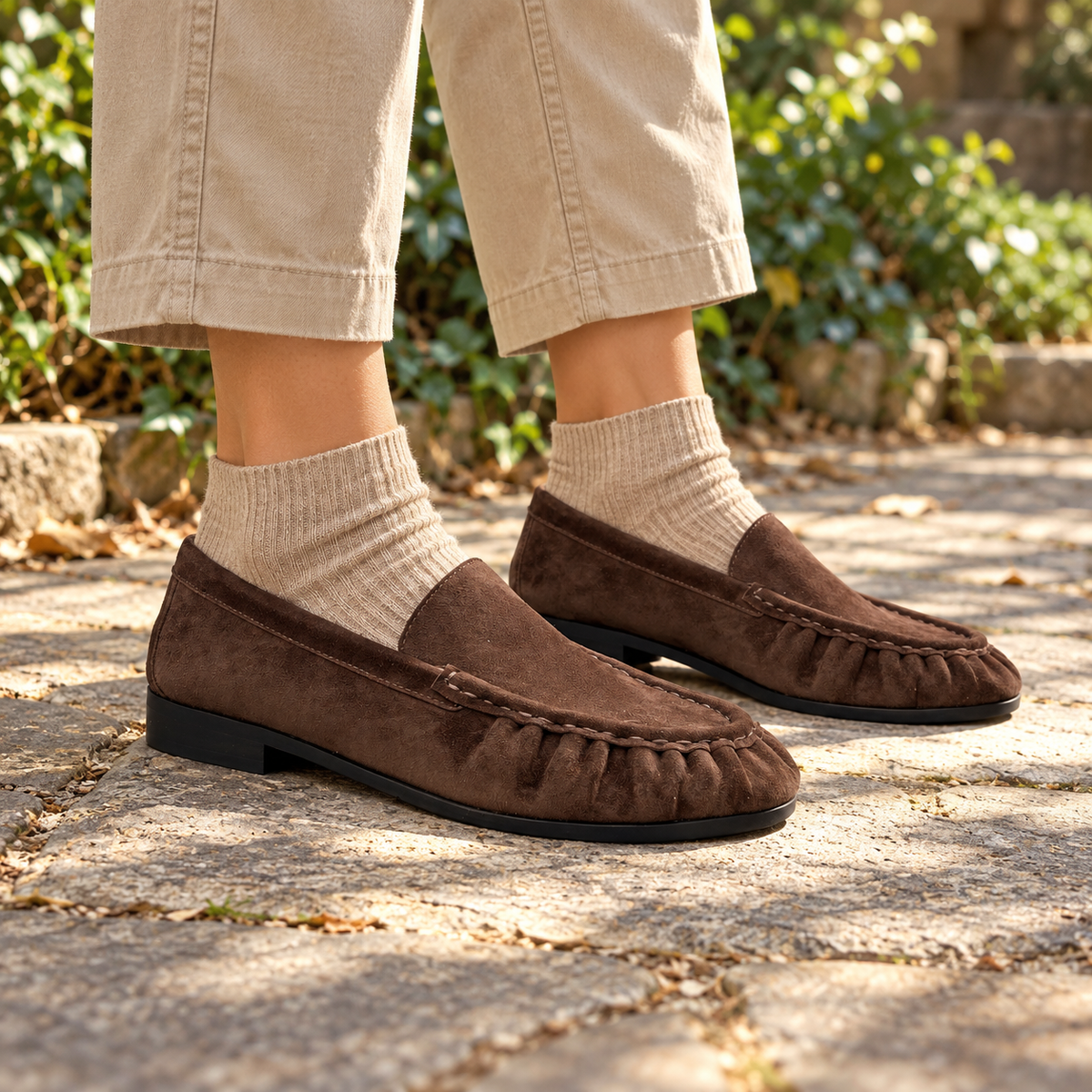 Dark Brown Sheep Suede Ruched Moc-Toe Loafers on foot