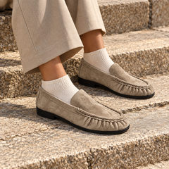 Taupe Sheep Suede Ruched Moc-Toe Loafers on foot