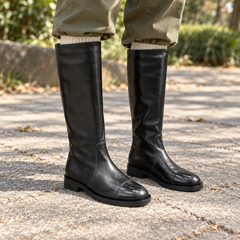 Black Cap-Toe Knee-High Leather Boots on foot