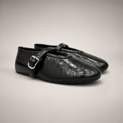 Black eel-embossed buckle-strap flat pair three-quarter view