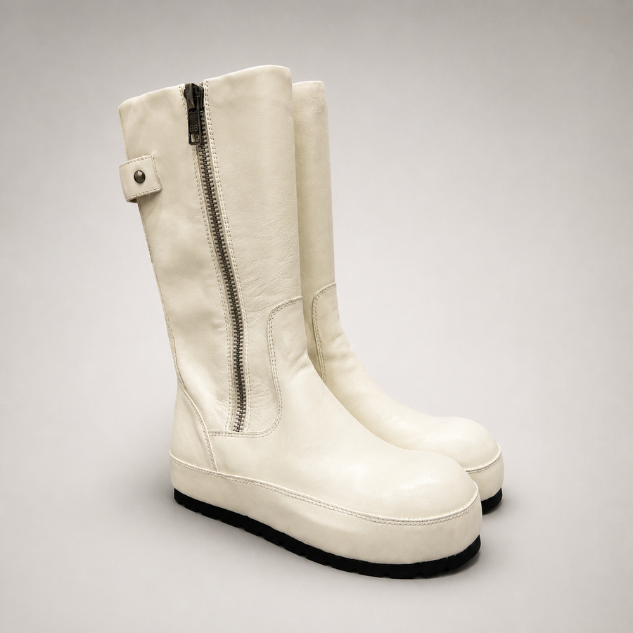 Cream Boots pair three-quarter view